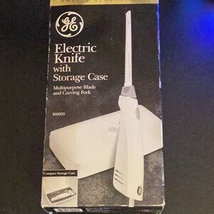 G E Electric knife with storage case. Carving fork not included.